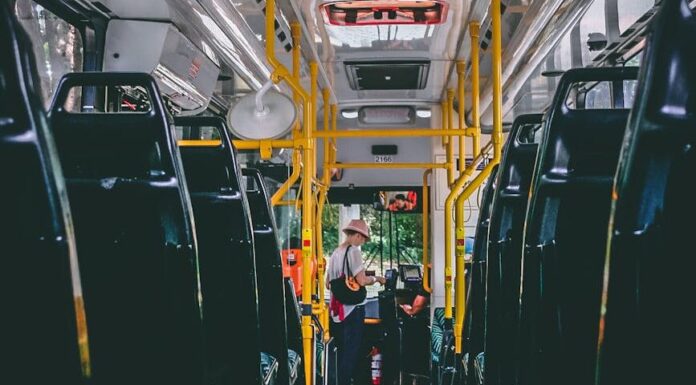 woman standing in bus