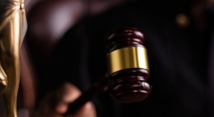 person holding a gavel