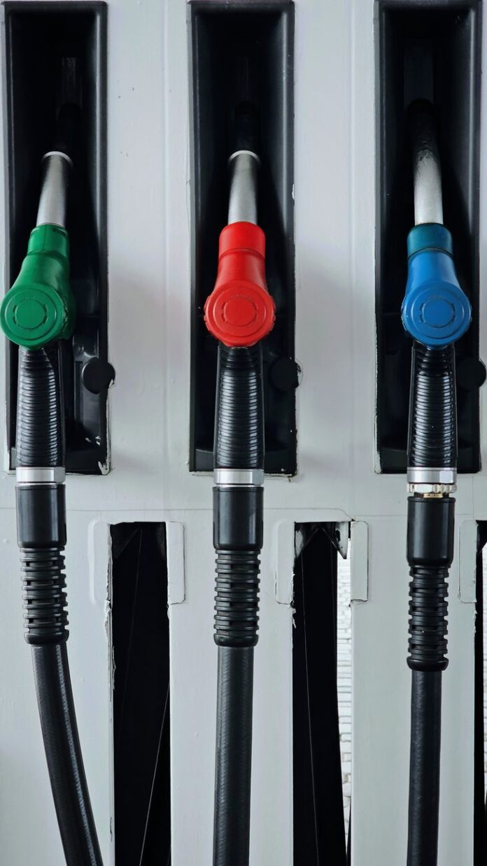 pexels-photo-31161428 colorful fuel pumps at a gas station